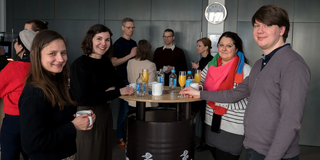 Persons celebrate the launch of Agile PAIR.